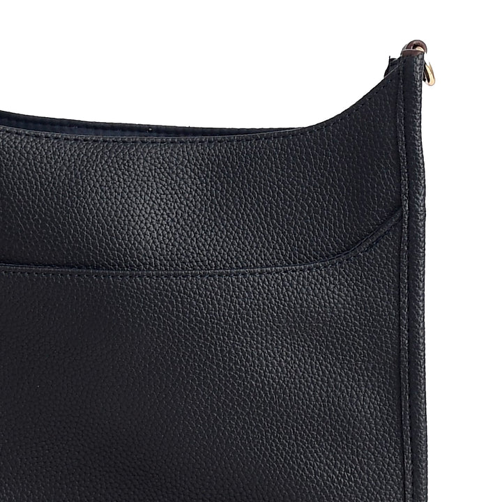 Close-up of a black leather bag with a zipper on a white background