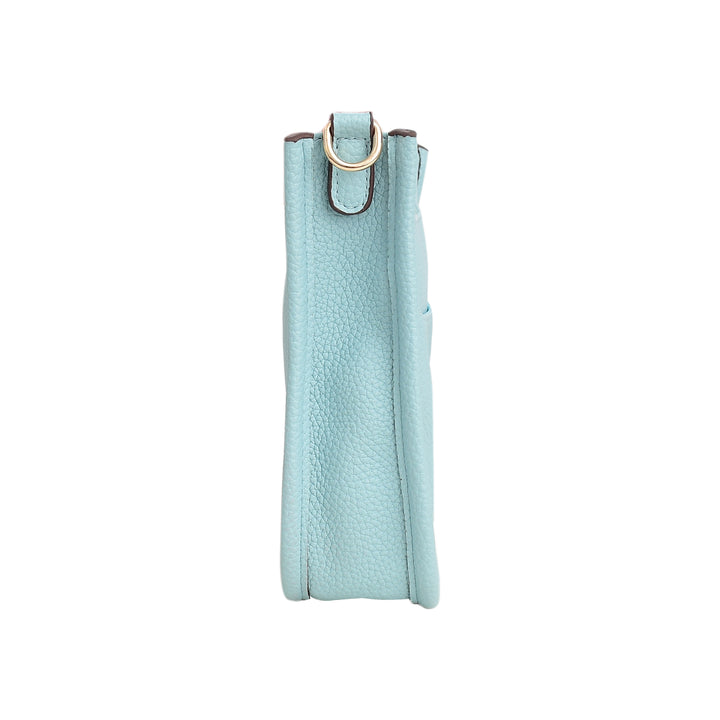 Light blue textured bottle holder with a gold clip on a white background
