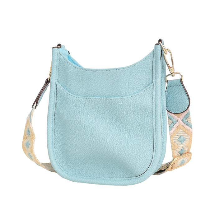 Light blue handbag with a patterned strap on a white background