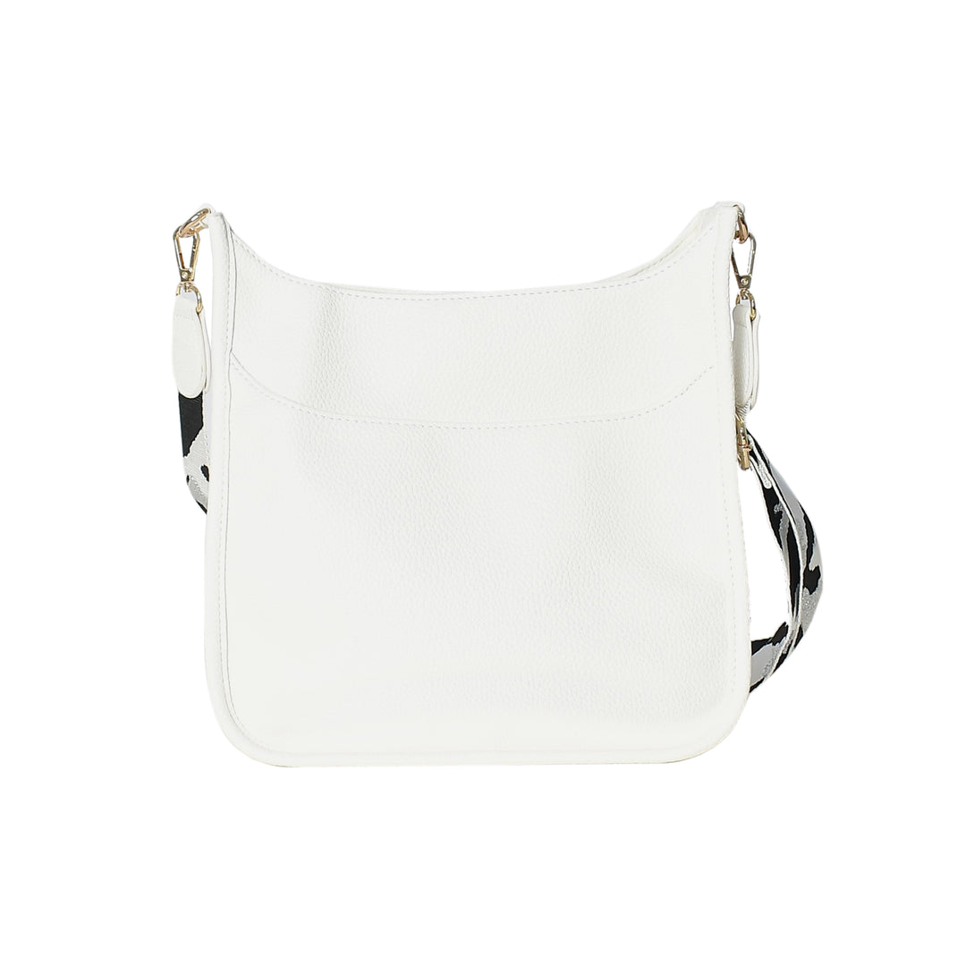 White handbag with black and white patterned strap on a white background