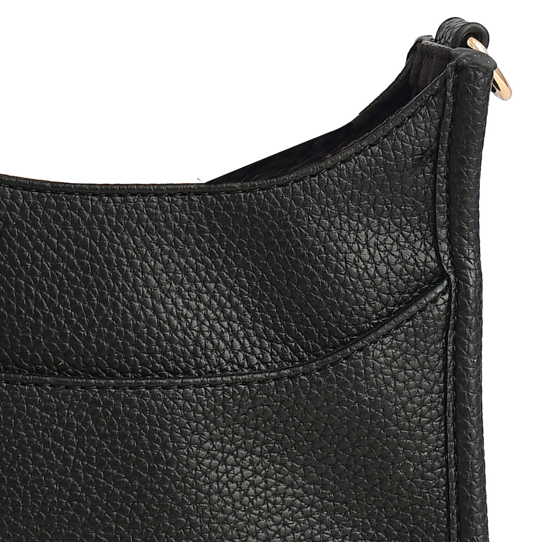 Close-up of a black leather handbag with a gold zipper.