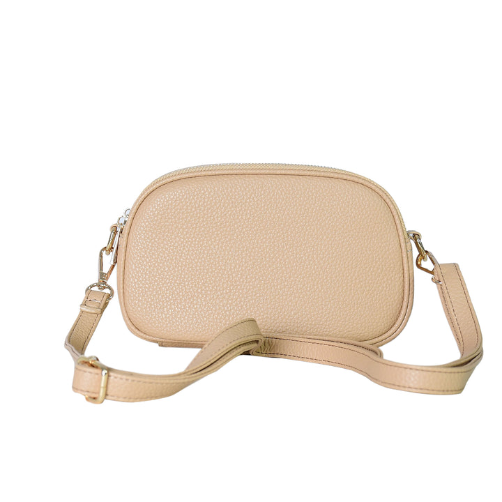 Beige crossbody bag on a white background