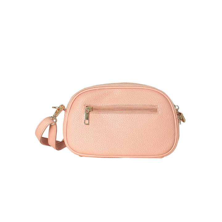 Pink crossbody bag on a white background