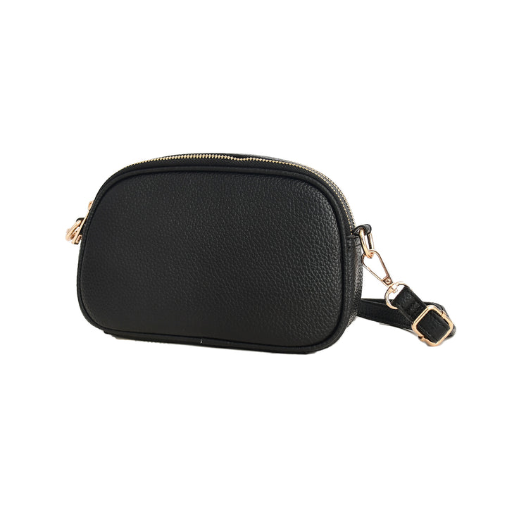Black leather crossbody bag with gold accents on a white background

