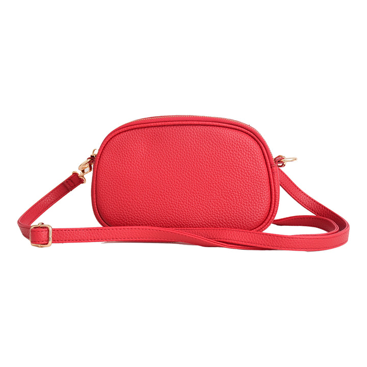 Red crossbody bag on a white background