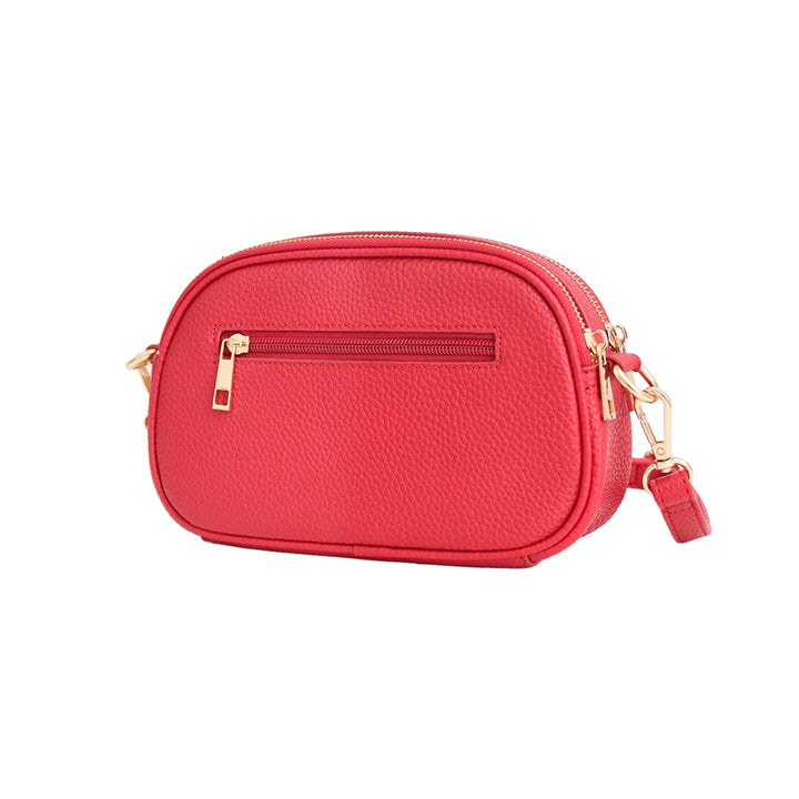 Red crossbody bag with gold accents on a white background