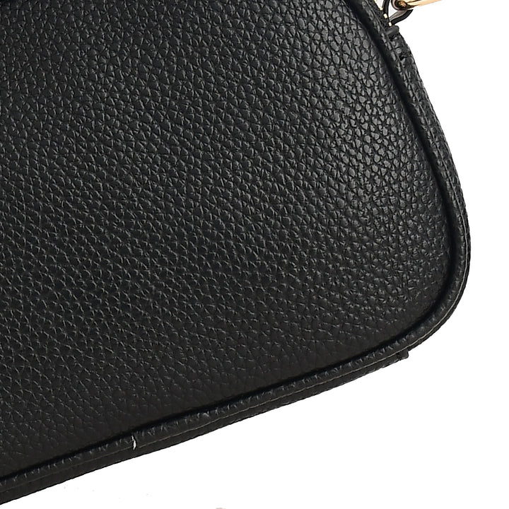 Close-up of a black leather handbag on a white background