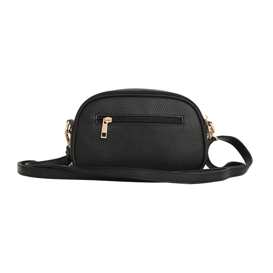 Black leather crossbody bag with gold zippers on a white background

