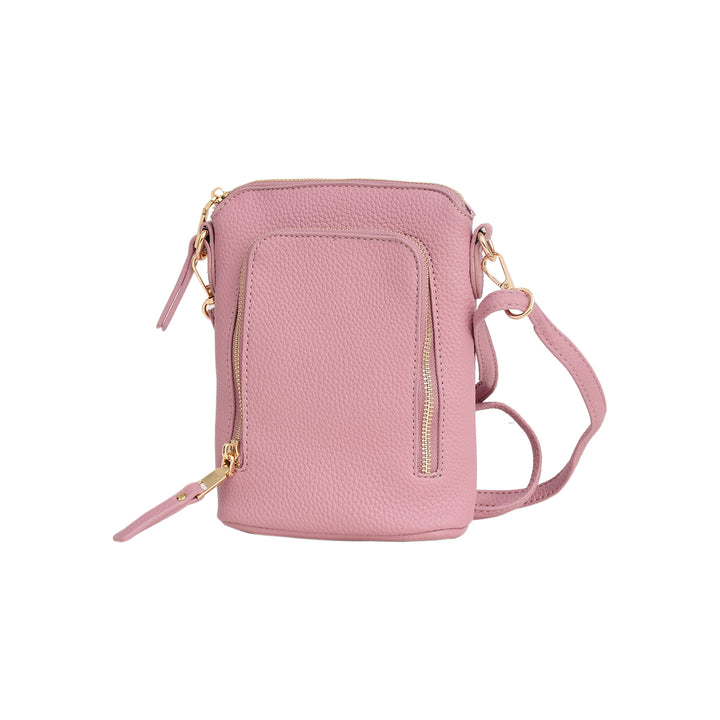 Pink crossbody bag with gold zippers on a white background