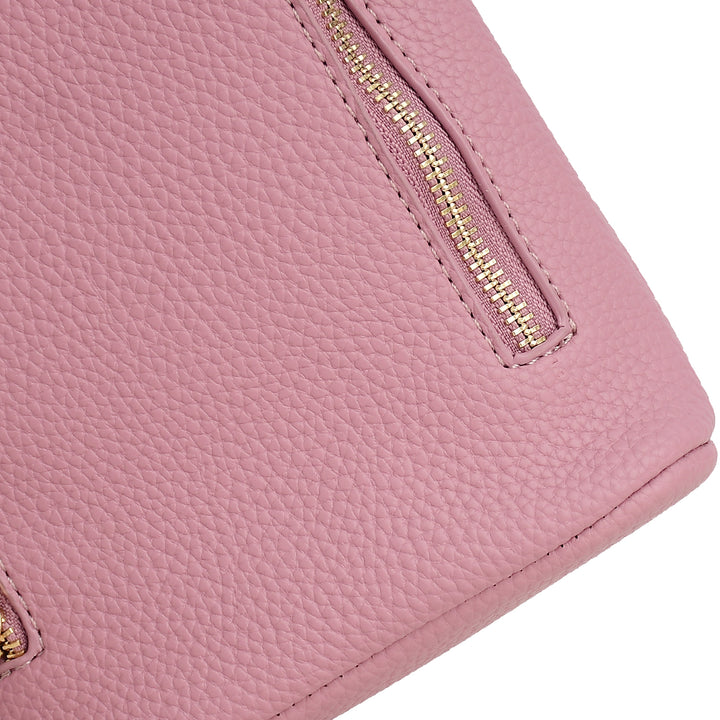 Close-up of a pink wallet with a gold zipper on a white background