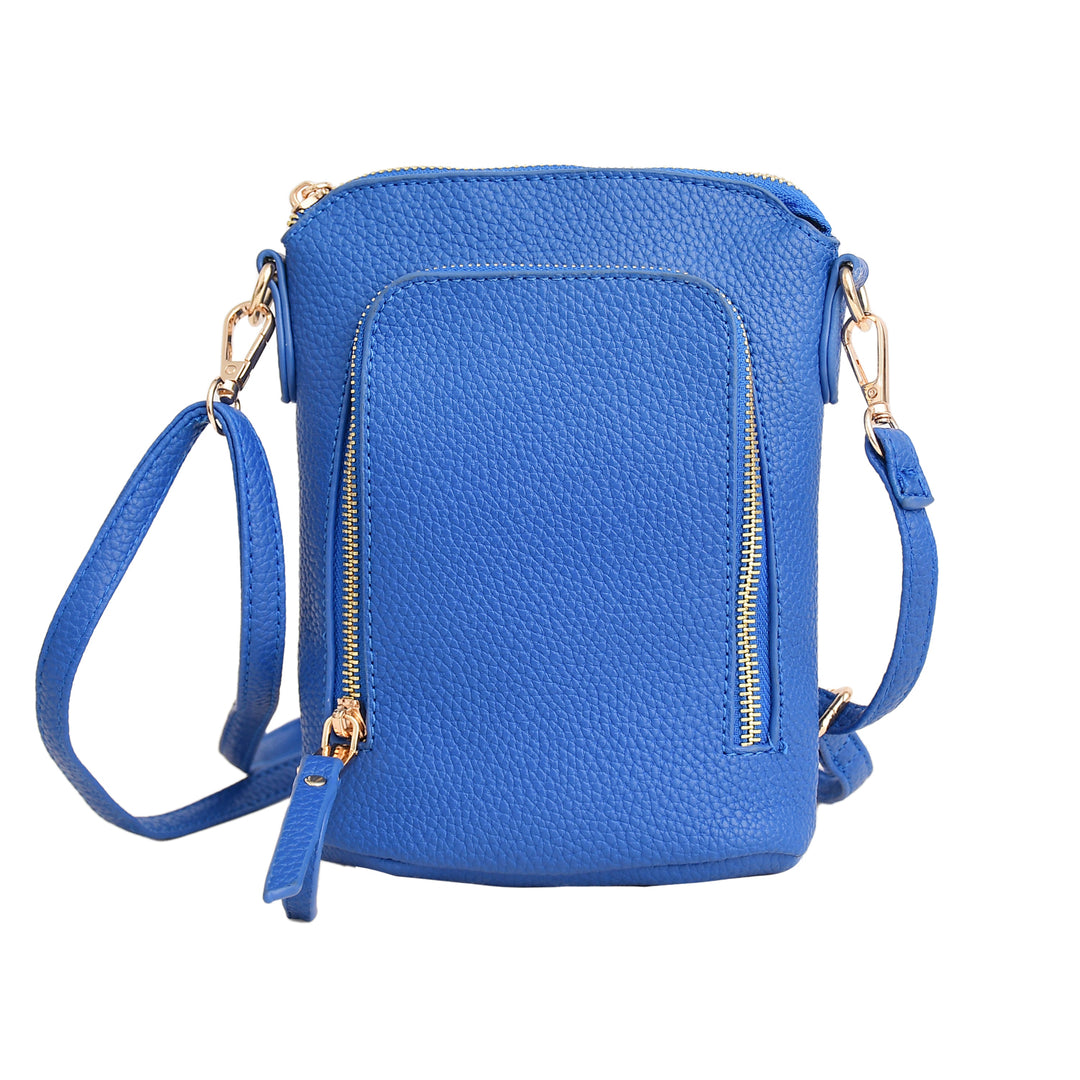 Blue crossbody bag with gold zippers on a white background