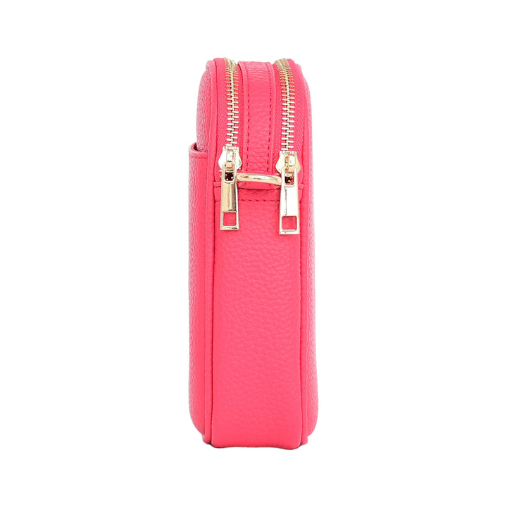 Pink rectangular pouch with gold zipper on a white background