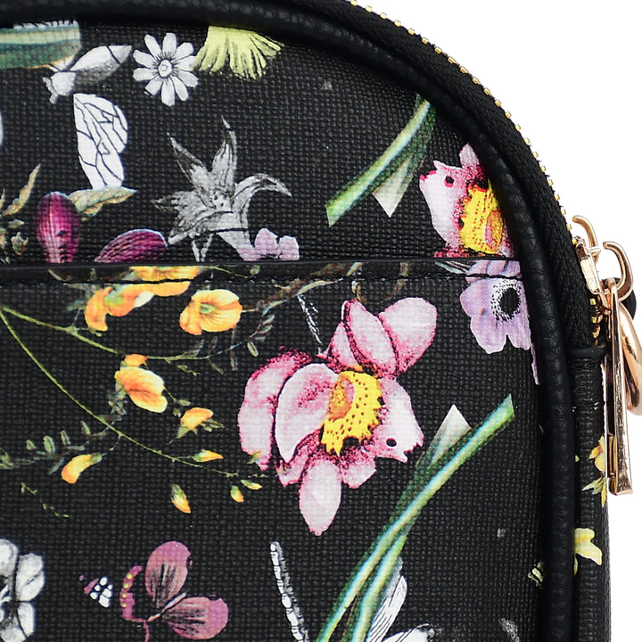 Floral and nature-themed pouch with a gold zipper on a black background