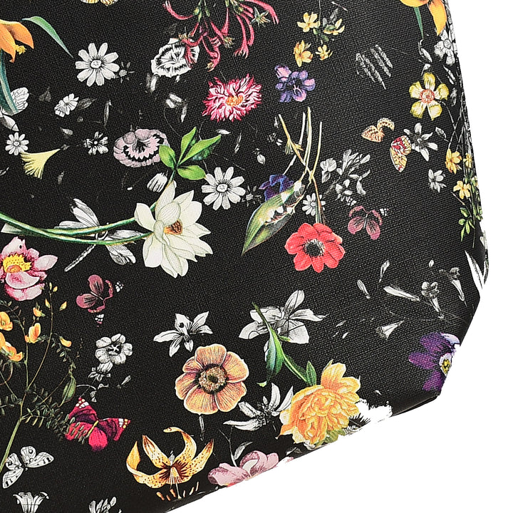 Floral patterned fabric with colorful flowers on a black background