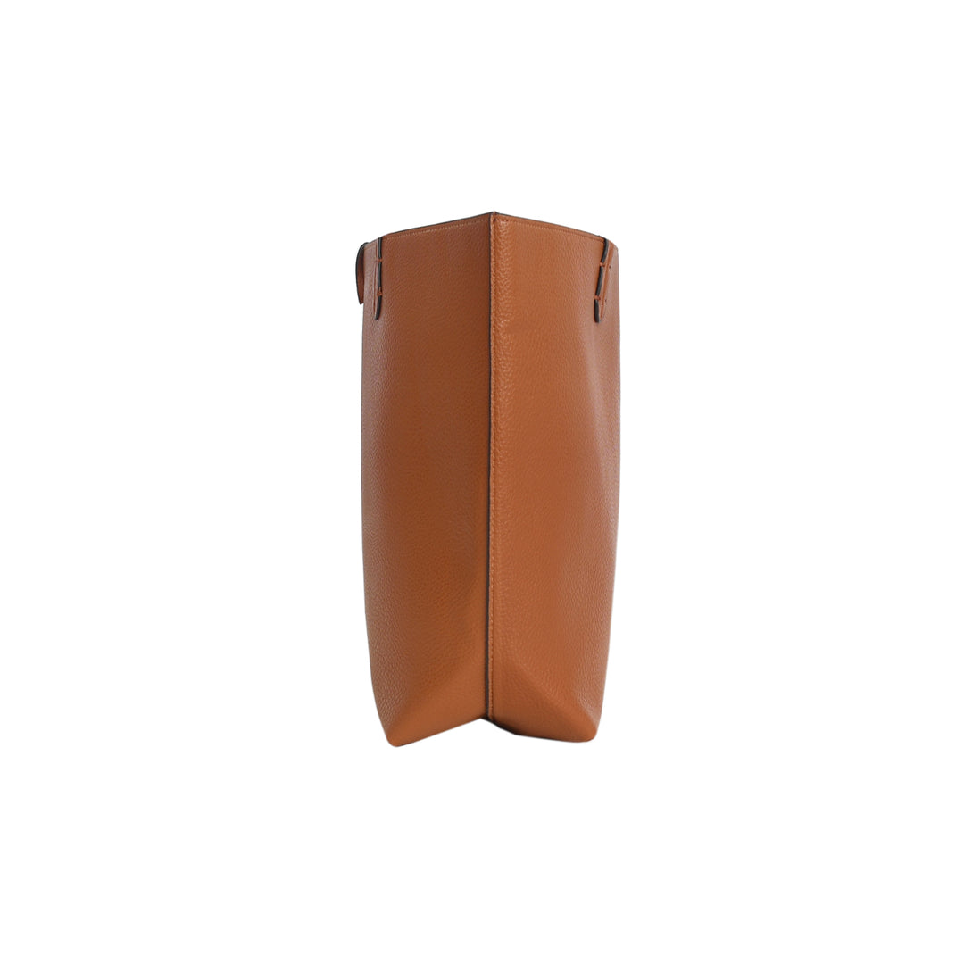 Brown leather boot on a white background