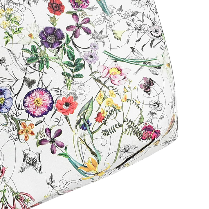 Clear plastic bag with colorful floral and insect design on a white background