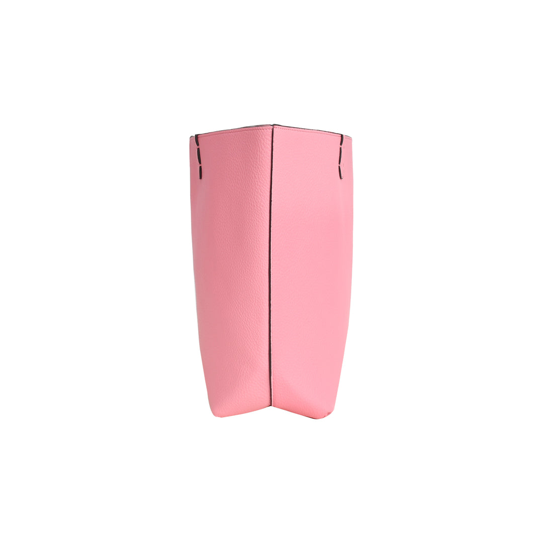 Pink geometric vase on a white background