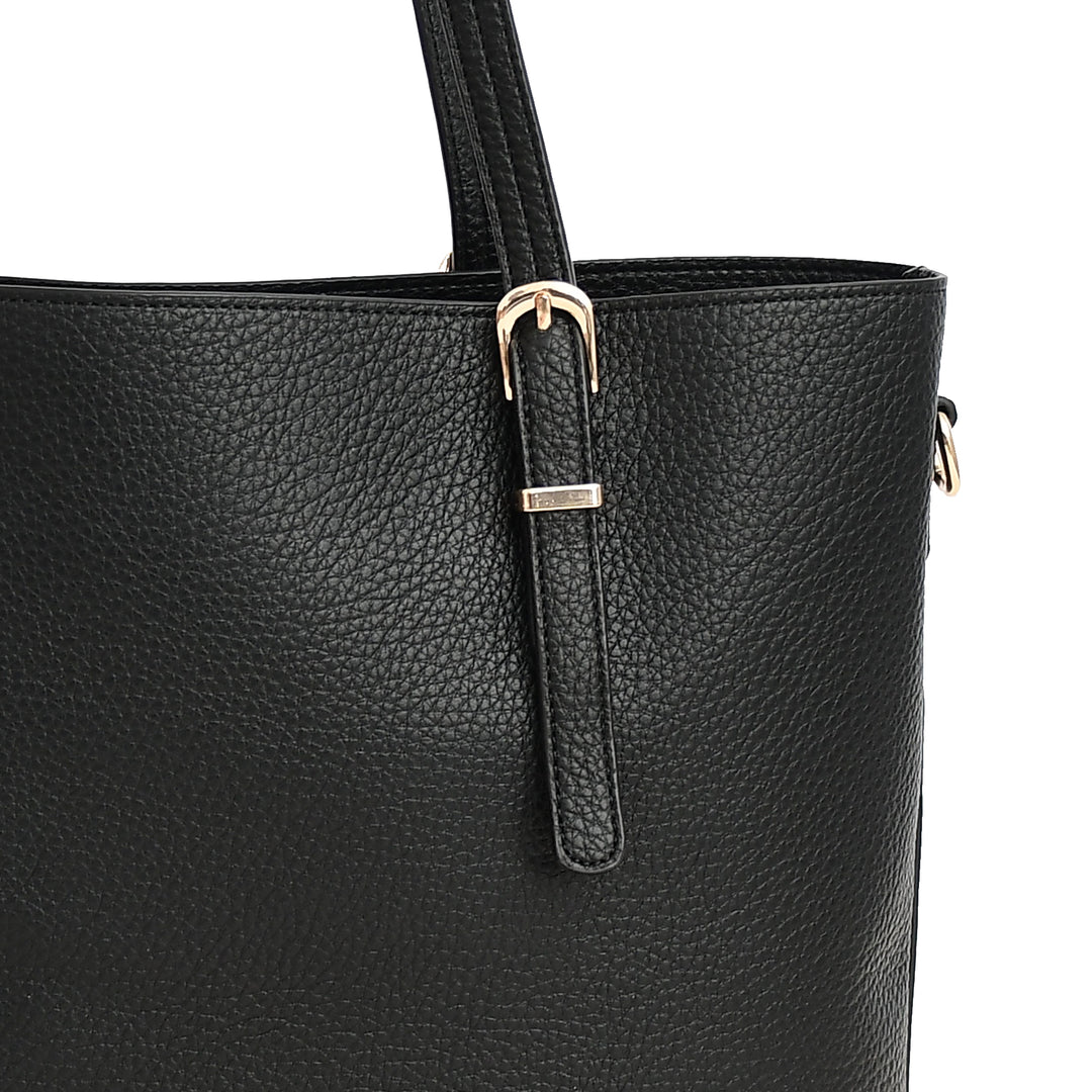 Black leather handbag with a gold buckle on a white background