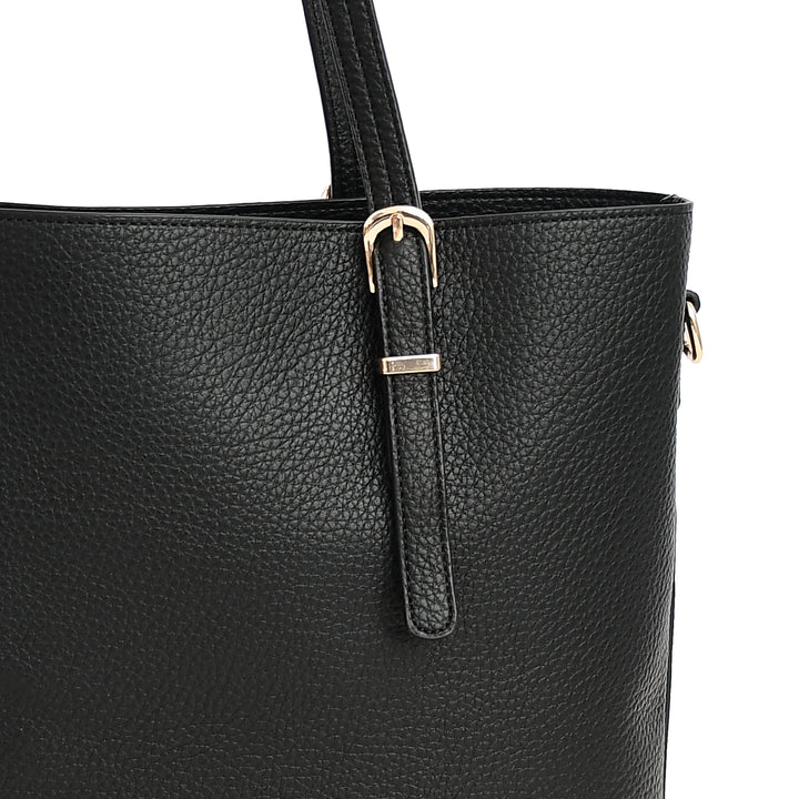 Black leather handbag with a gold buckle on a white background
