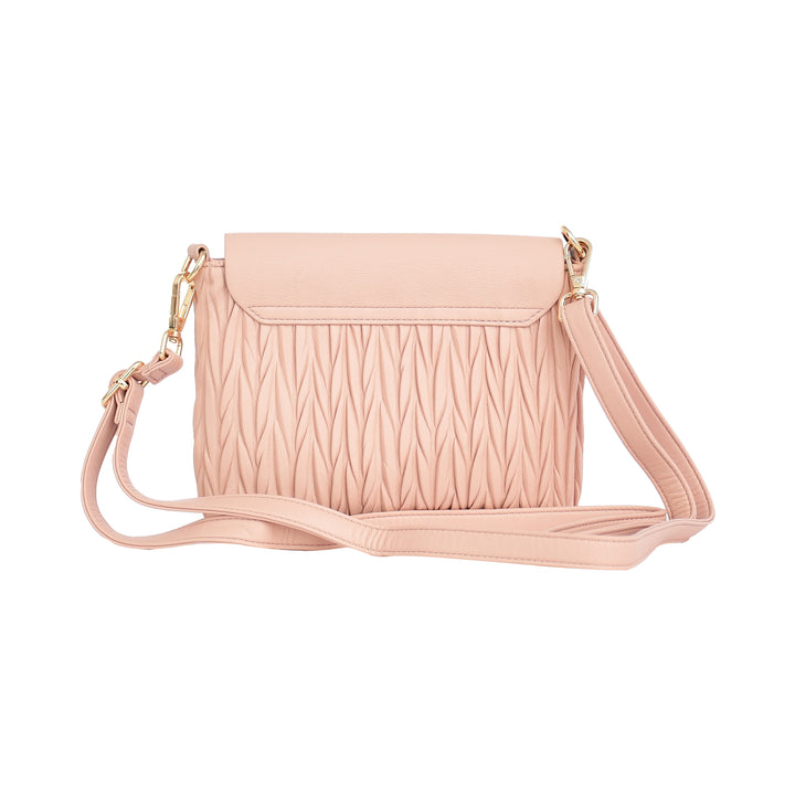 Pink crossbody bag with a textured pattern on a white background