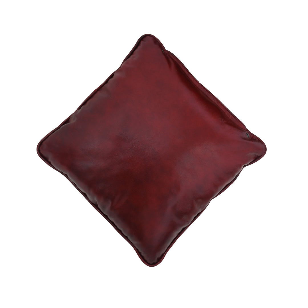 Brown leather pillow on a white background