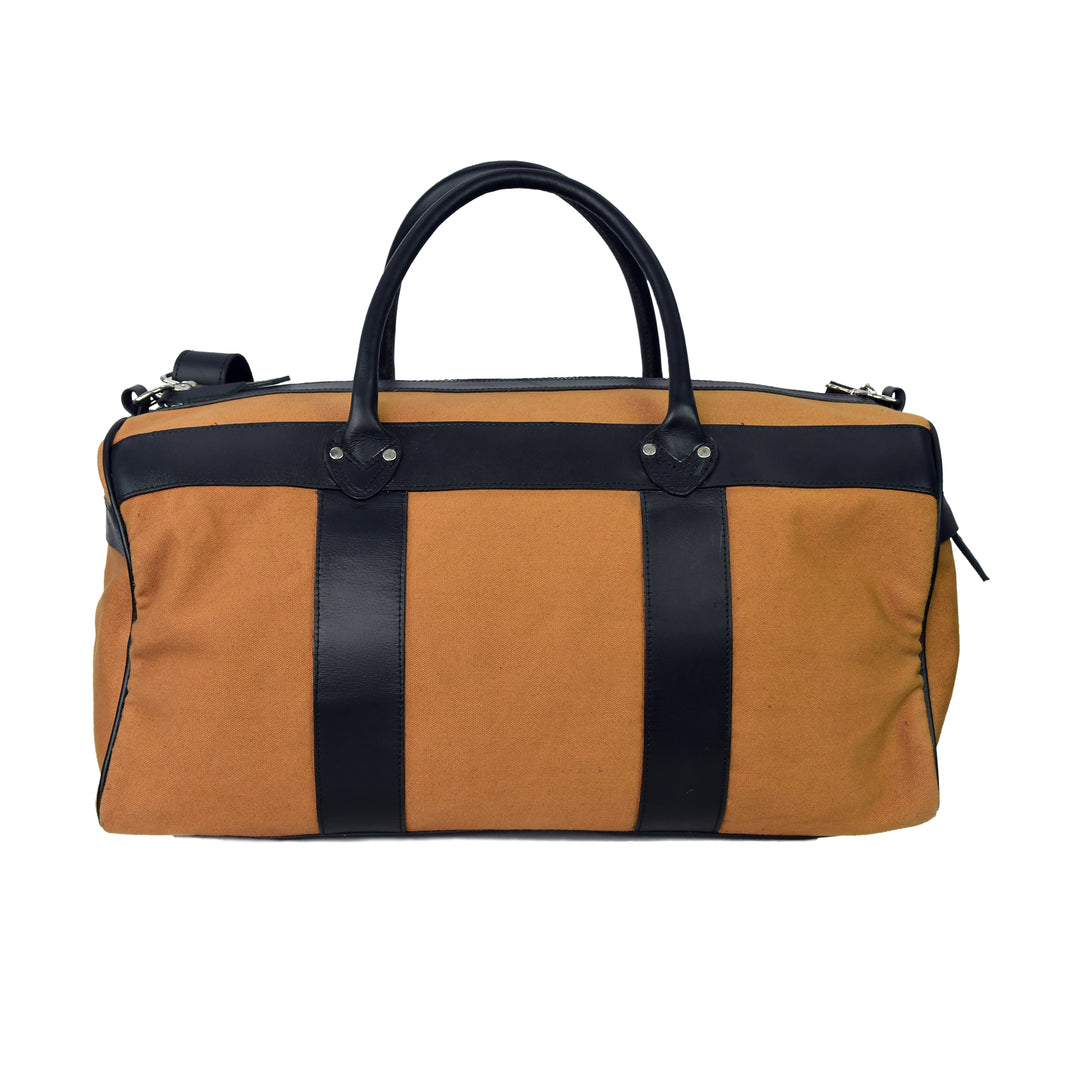Brown duffel bag with black straps on a white background