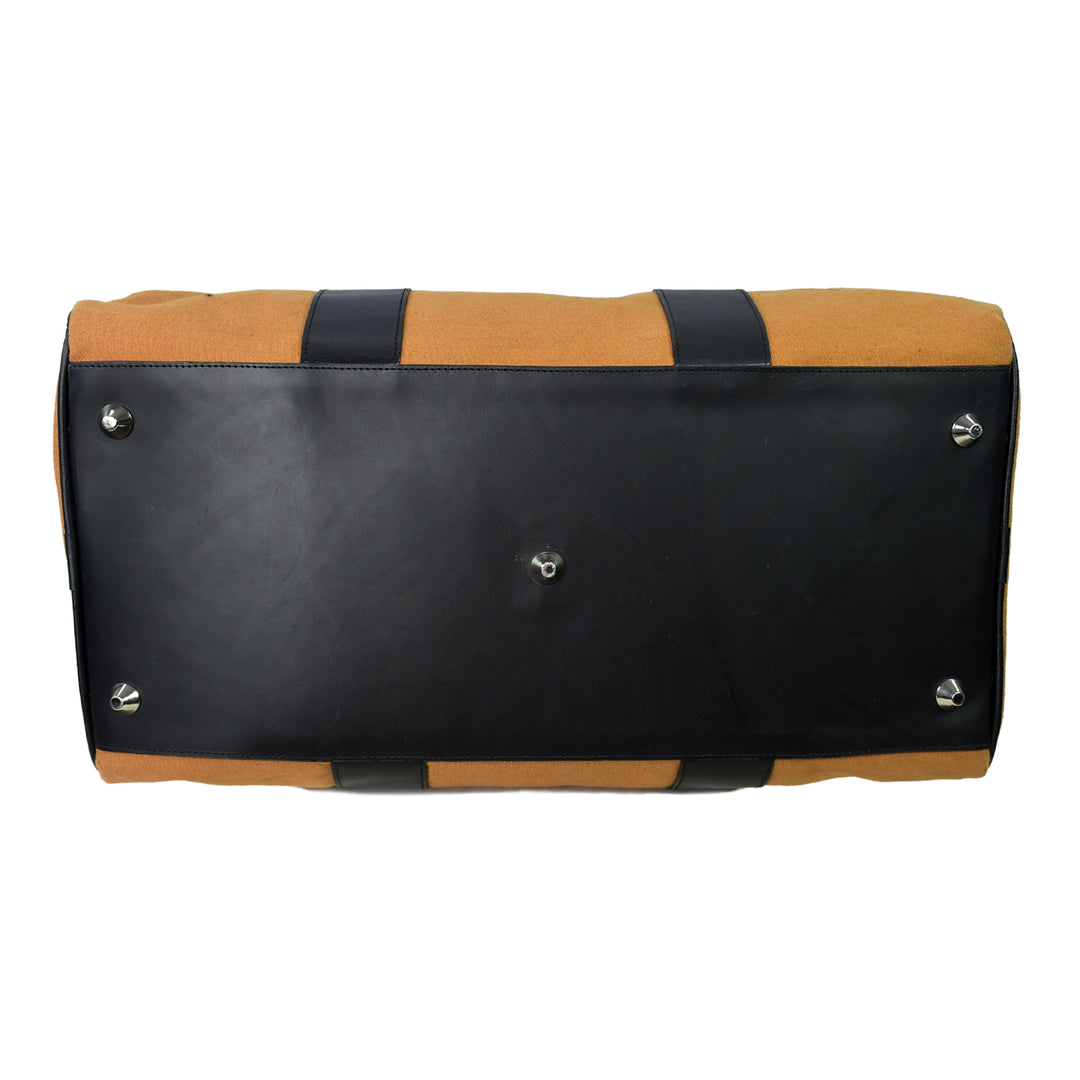 Black and brown duffel bag on a white background