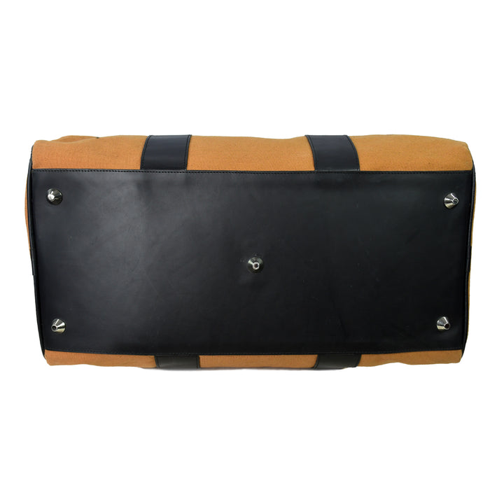 Black and brown duffel bag on a white background