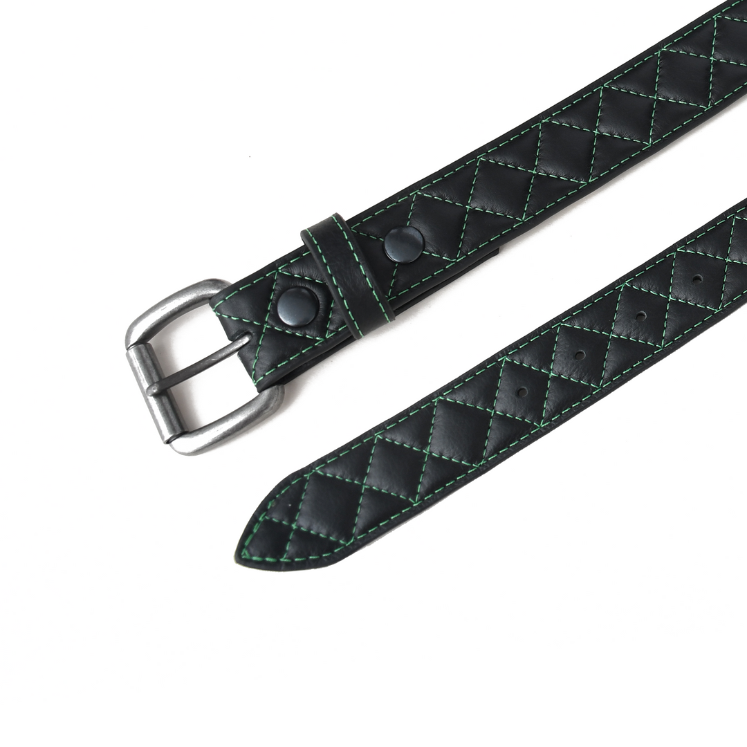Green quilted leather belt with silver buckle on a white background