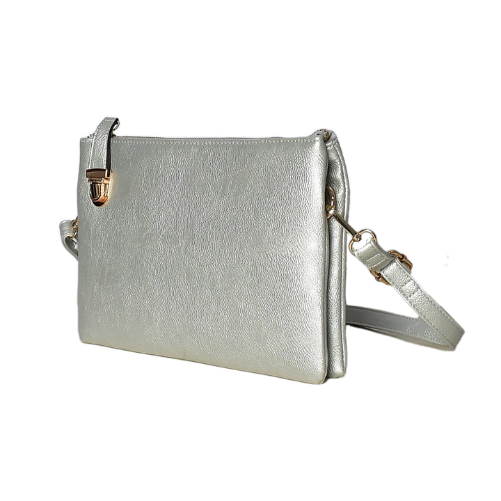 Silver handbag with a strap on a white background