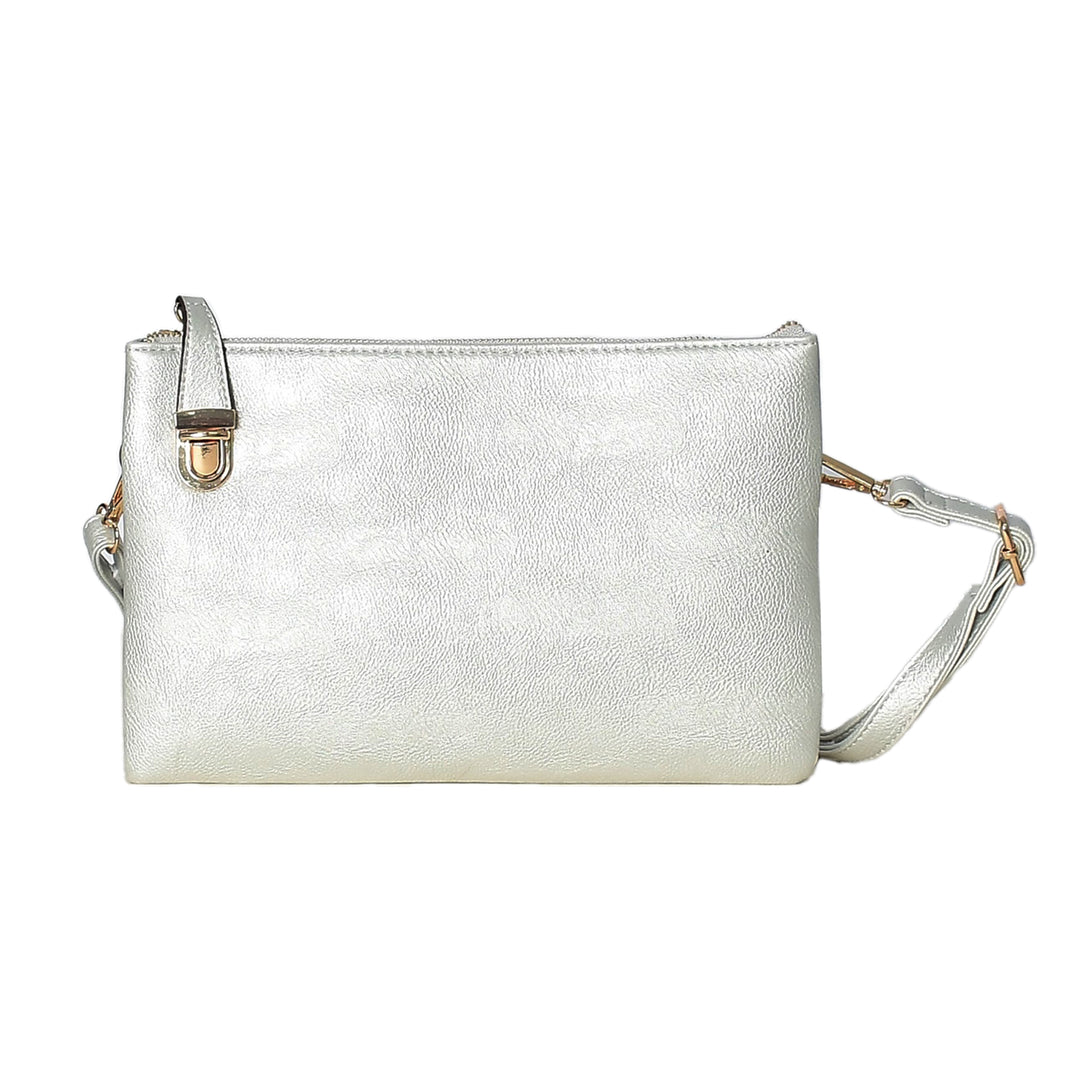 Silver metallic handbag with a strap on a white background