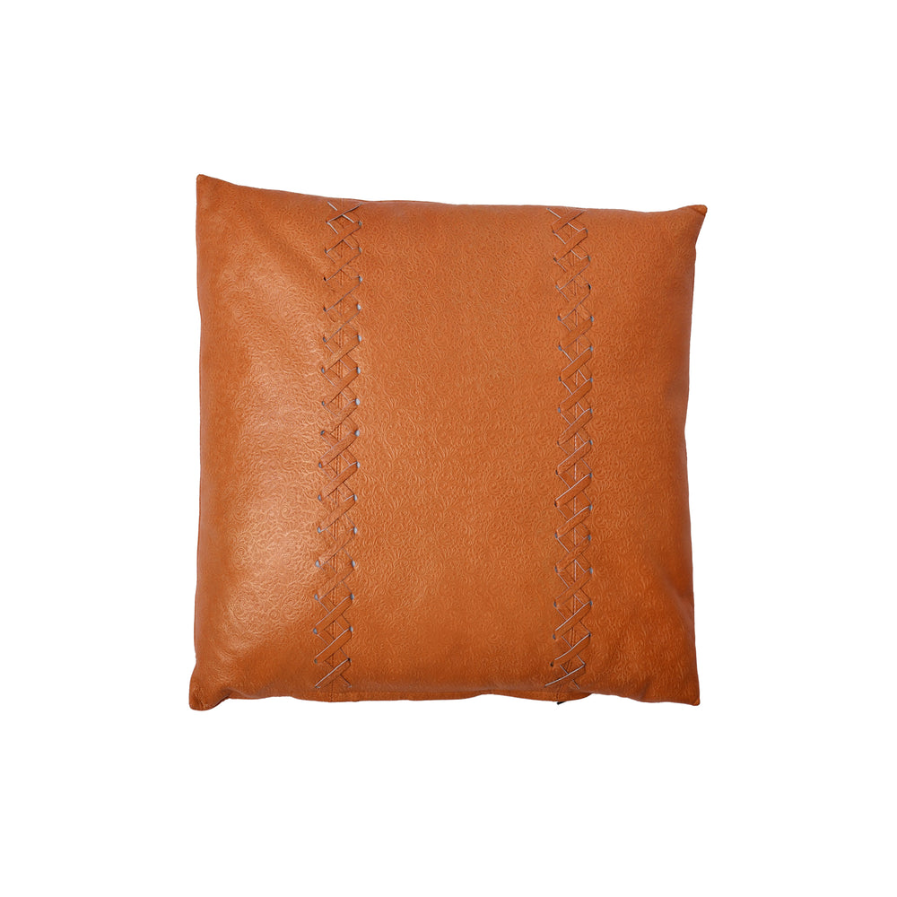 Brown leather pillow with decorative stitching on a white background

